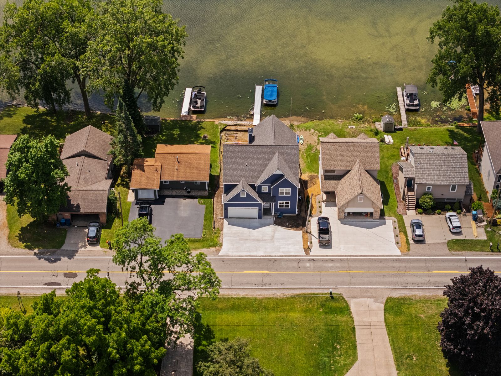 Aerial view of waterfront homes and docks