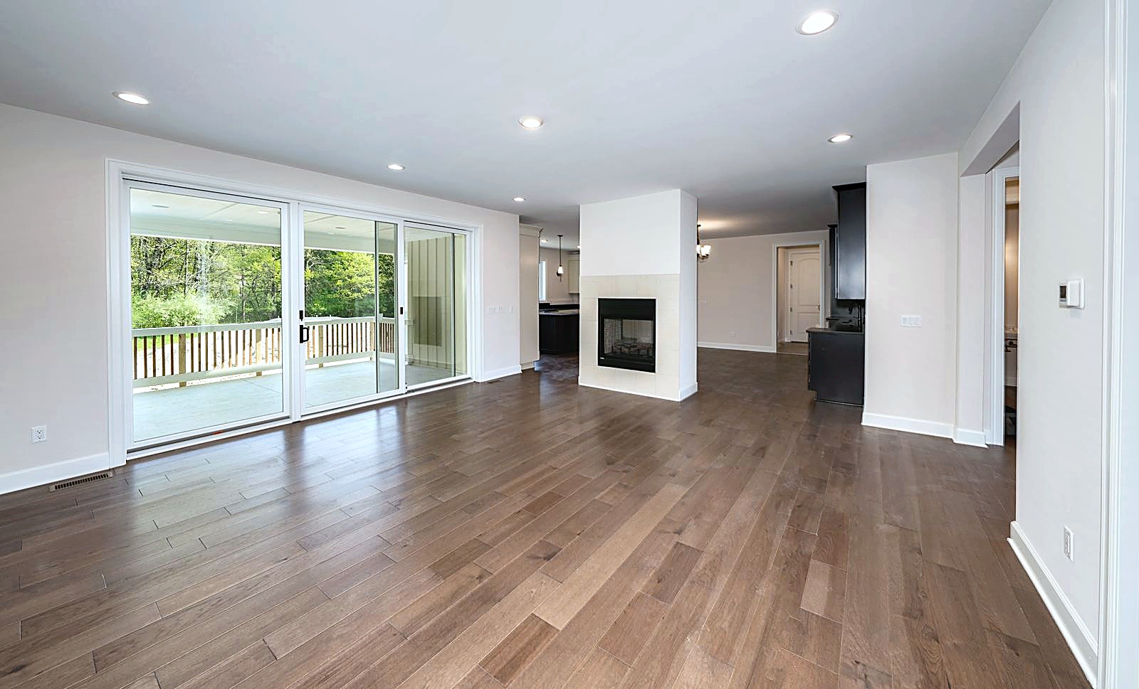 Great room with fireplace and sliding glass doors