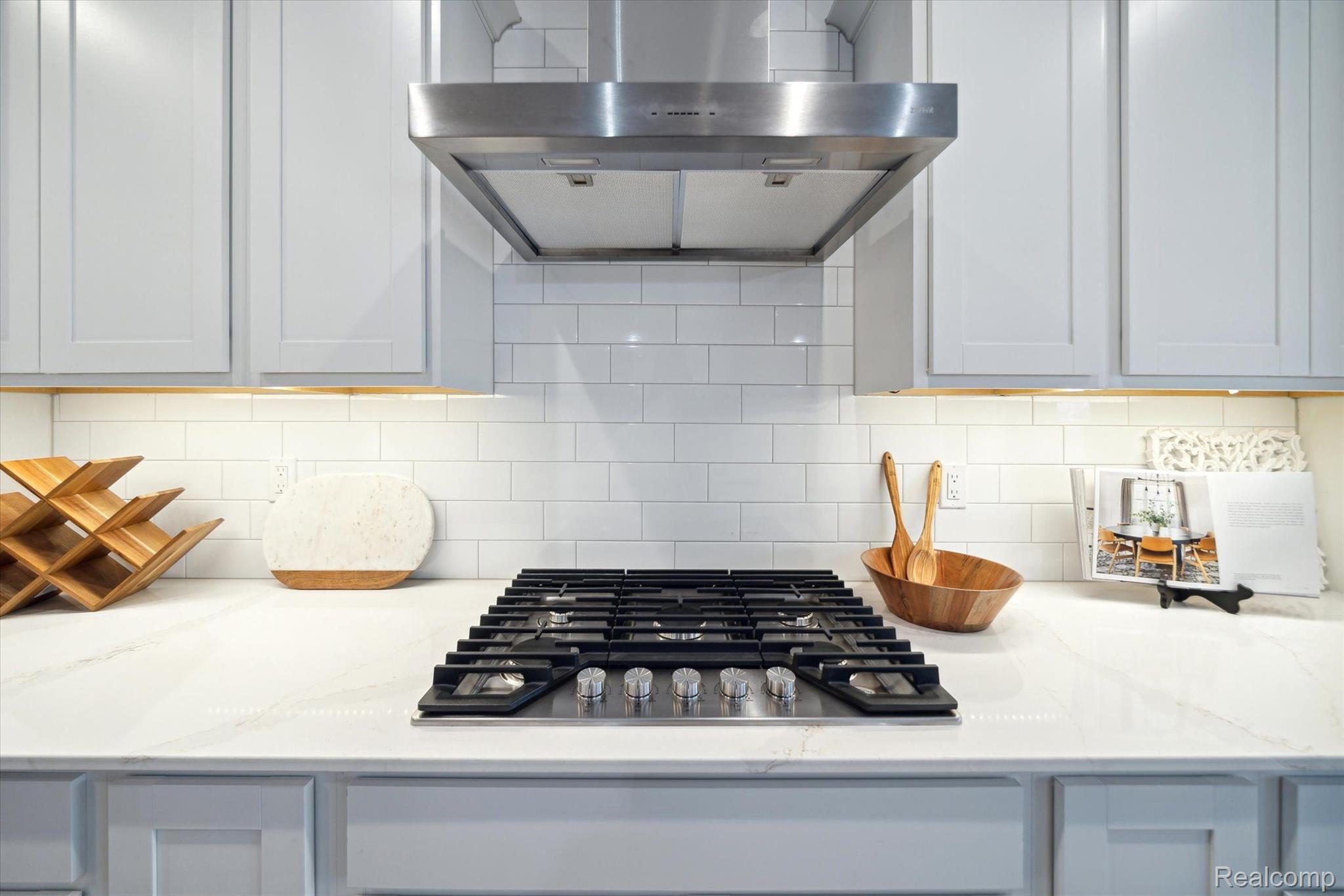 Kitchen cooktop and tile backsplash detail