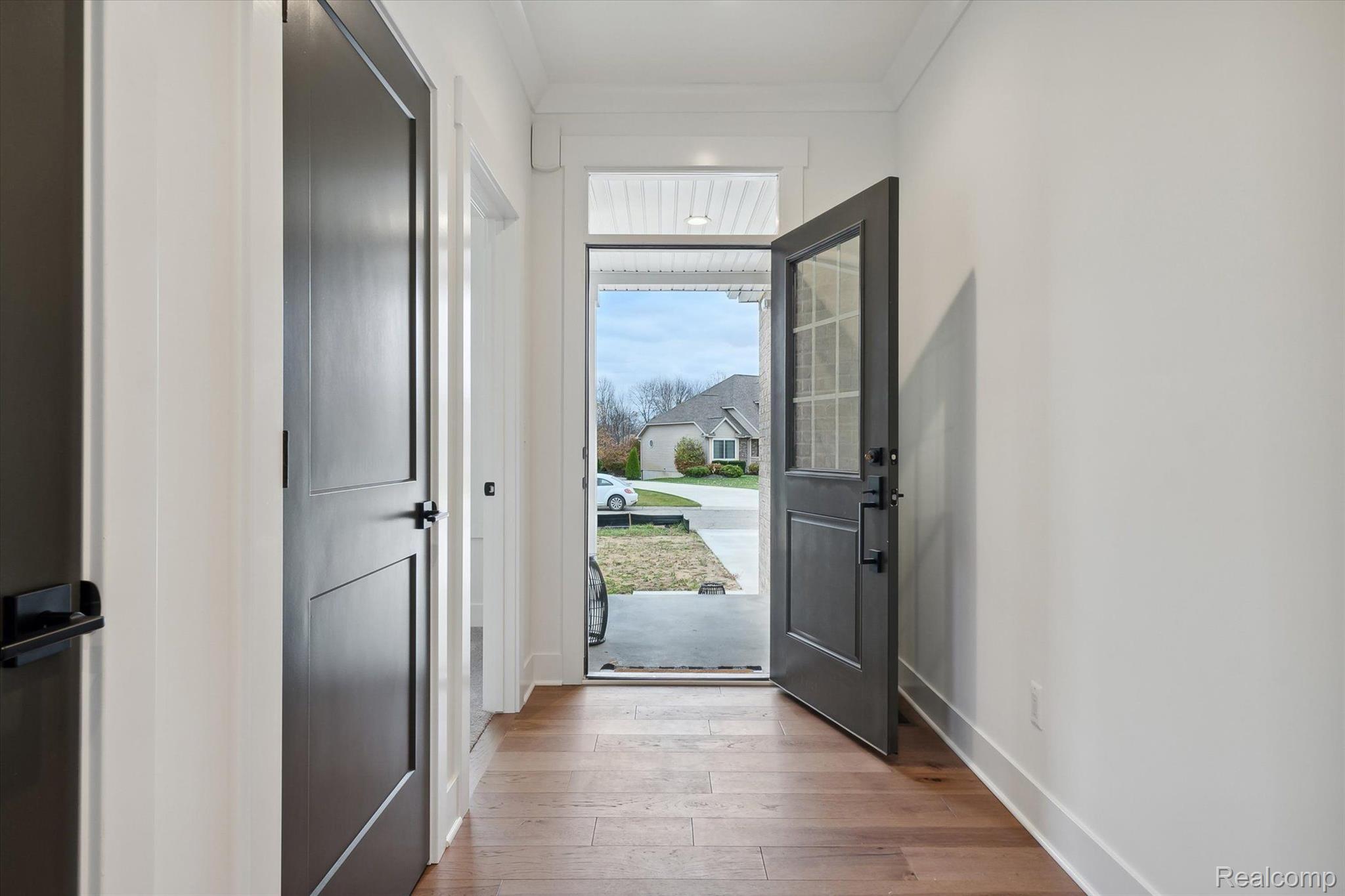 Entry foyer with wood floors