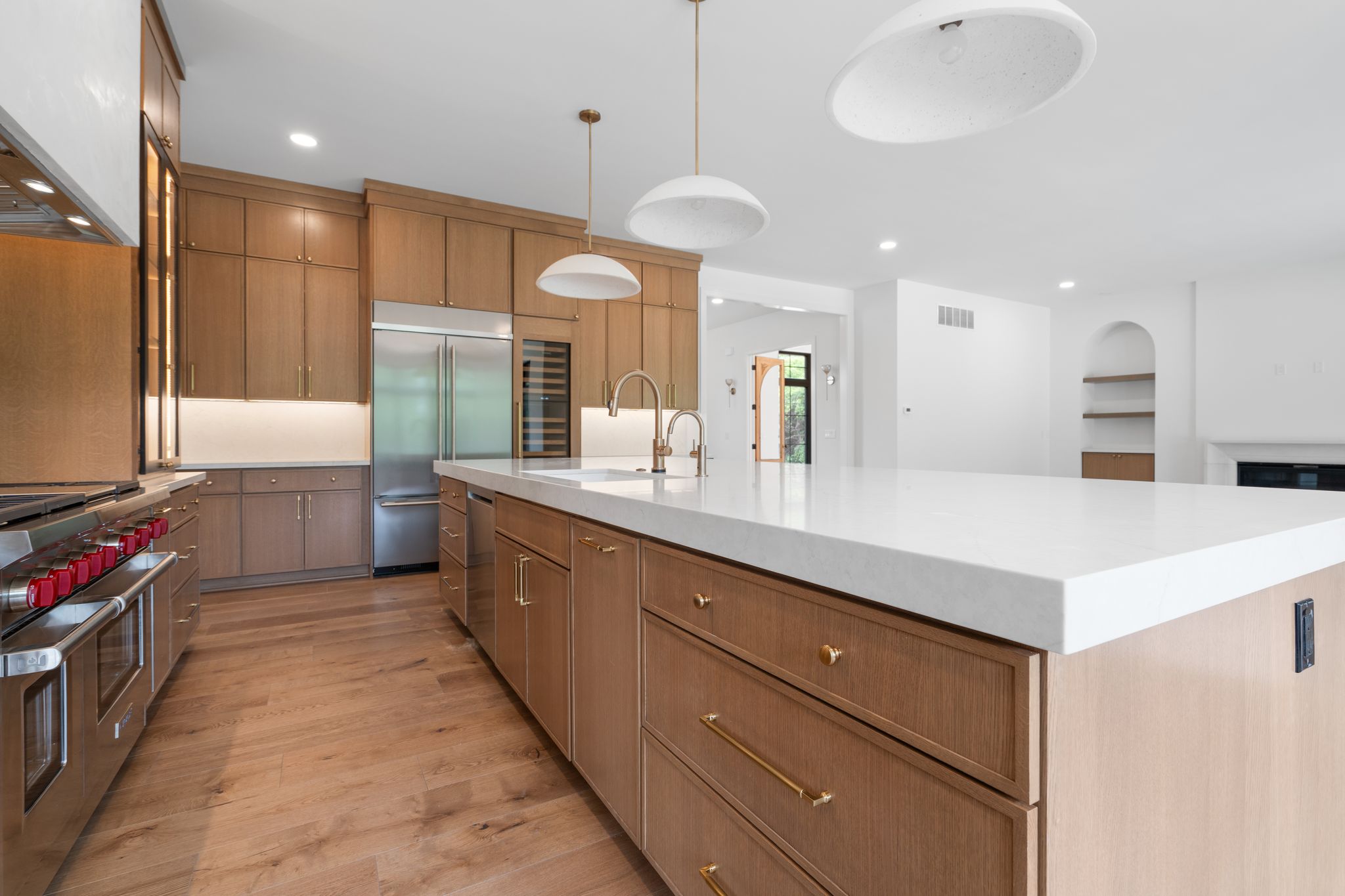 Bright transitional kitchen with oak and cream cabinetry